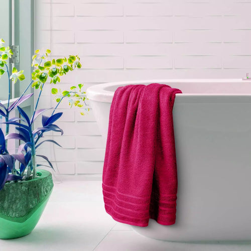 Super-soft cotton bath sheet towels in a bathroom setting